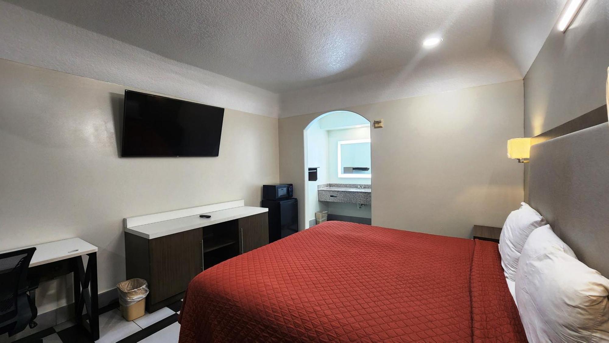 Scottish Inn & Suites Sam Houston Parkway Zewnętrze zdjęcie
