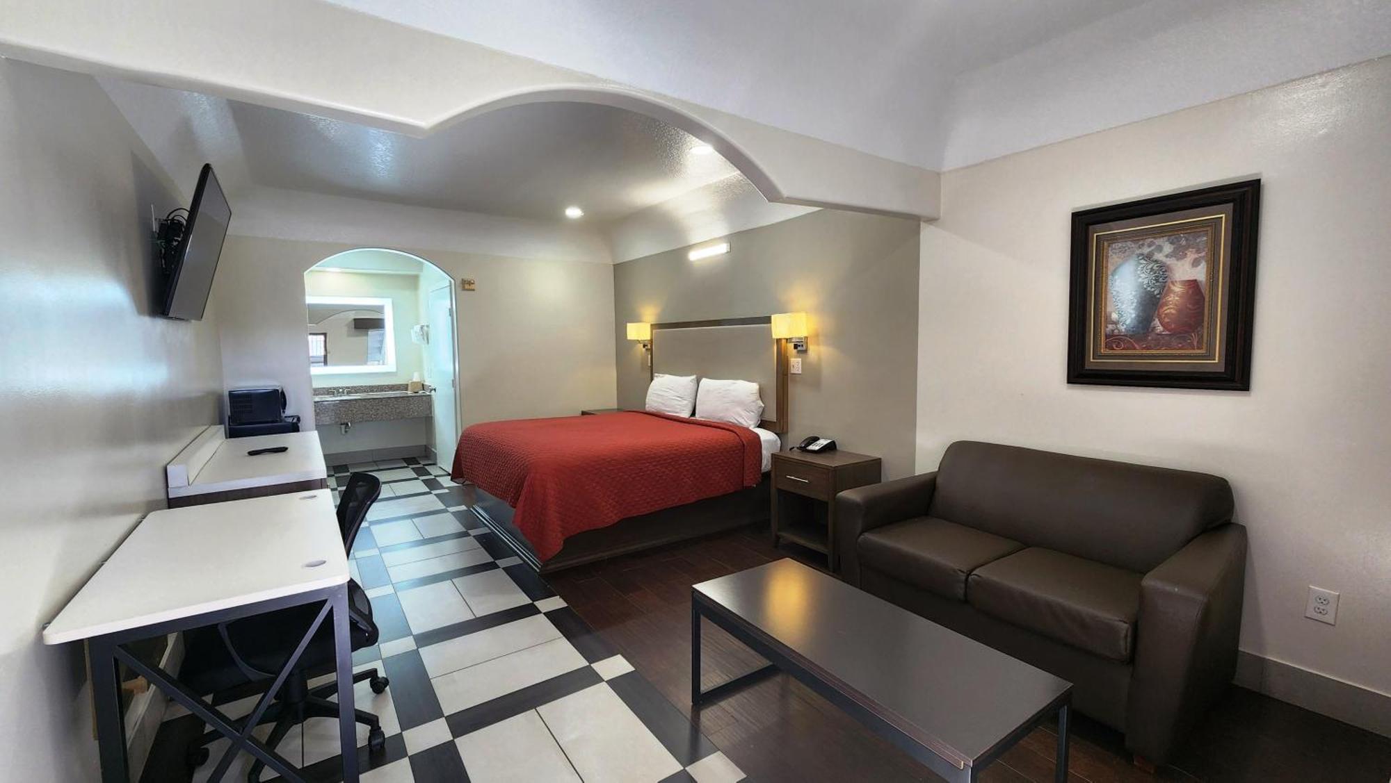 Scottish Inn & Suites Sam Houston Parkway Zewnętrze zdjęcie