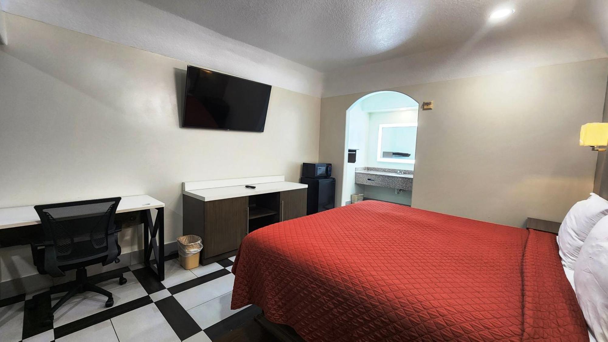 Scottish Inn & Suites Sam Houston Parkway Zewnętrze zdjęcie